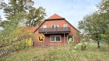 R�ckseite Resthof + 1 ha Land zu verkaufen